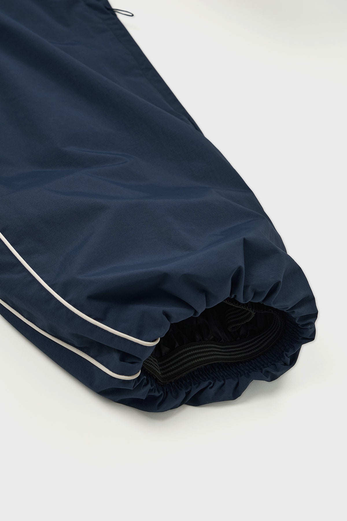 [CHAMPION x DIMITO] SCRIPT TRACK BANDED PANTS (WIDE FIT LV.2) YALE BLUE (Available date : 26.10.12)